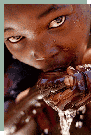 child drinking clean water
