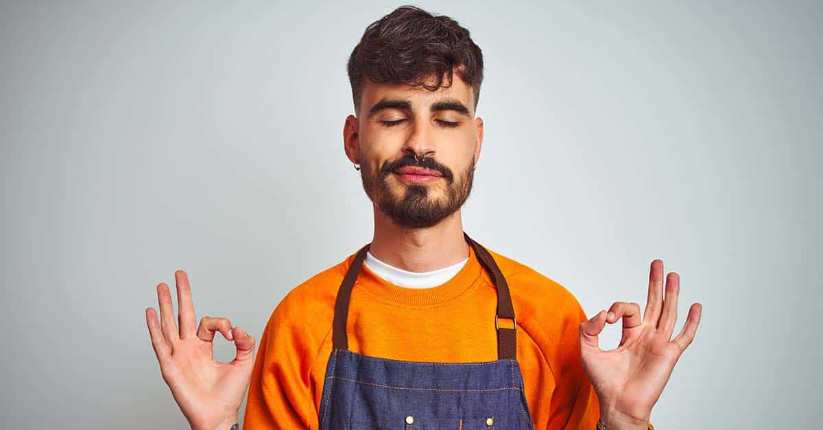young shopkeeper practicing strong minds meditation