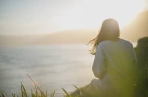 Mindful in May woman at the beach